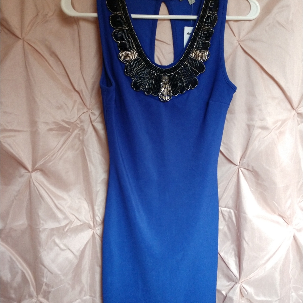 Royal blue, tight-fitted dress